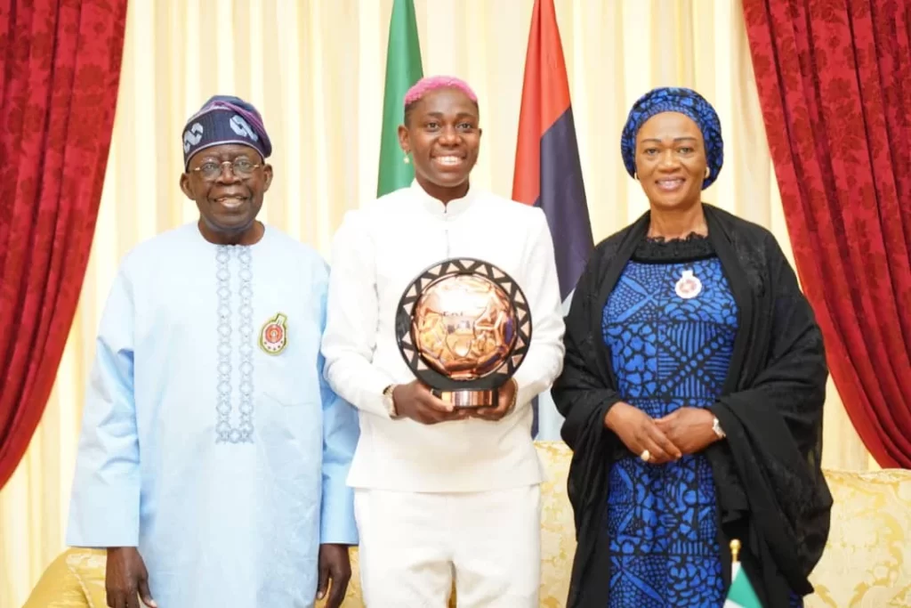 Nigerian Football Star Asisat Oshoala Presents Award to President Bola Tinubu and First Lady Oluremi Tinubu